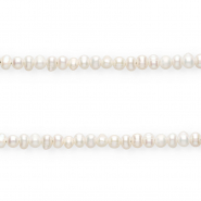 Imperfecte zoetwaterparels rond 5-6mm Ivory