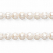 Imperfecte zoetwaterparels rond 9-10mm Natural white