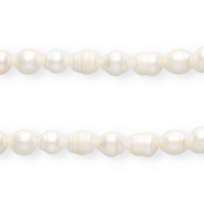 Imperfecte zoetwaterparels rice 12x10mm Natural white