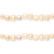 Imperfecte zoetwaterparels rond 7-9mm Peach rose