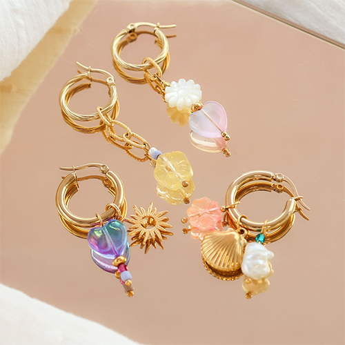 Zo cre&euml;er je oorbellen en telefoonkoord met glaskralen