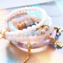 Trendy pastel sieraden en accessoires met crackled opal glaskralen